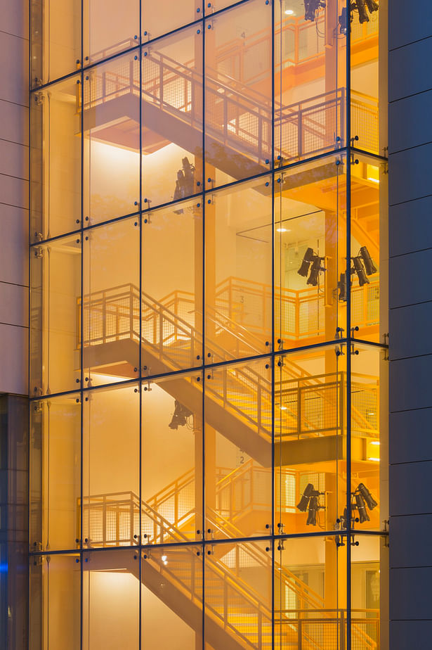 Photo by Jeff Goldberg/Esto The “Big Stair” connects the users to each floor, while offering full light and open views to the neighborhood. At night Racine Avenue glows in the light emanating from both the glass curtain wall of the stairway and the main lobby of the thrust theatre. 