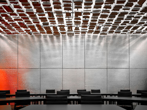 The presenter’s view of the training room inspires the guests. Suspended recycled toner cartridges create a celestial ceiling. The reflection to the left has been affectionately described as the “smudge.” 