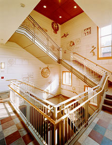 The main stair circulation is animated by an illustrated history of science from the lever at the ground floor, to the computer chip at the top floor. 