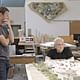 Mark Zuckerberg and Frank Gehry survey designs for the Facebook campus.