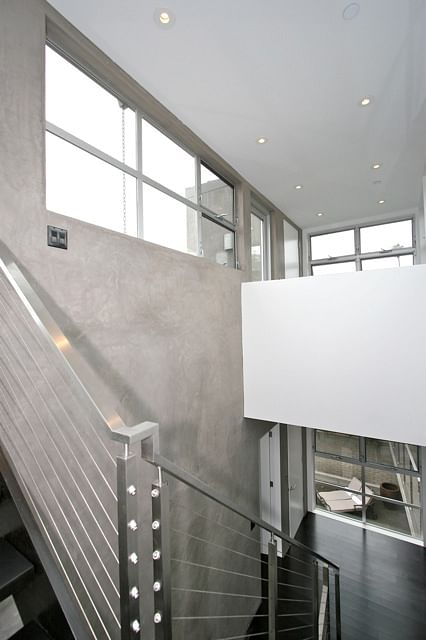 MontanaAveResidence-view into atrium stairs from 3rd level