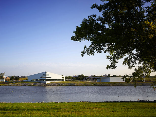 Main Building and raft building viewed from the south side of the Oklahoma River.