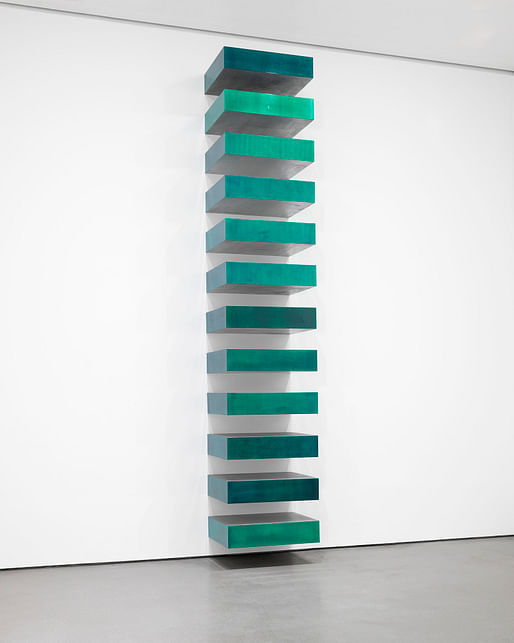 Donald Judd. Untitled. 1967. Lacquer on galvanized iron; Twelve units, each 9 x 40 x 31″ (22.8 x 101.6 x 78.7 cm), installed vertically with 9″ (22.8 cm) intervals. The Museum of Modern Art, Helen Acheson Bequest (by exchange) and gift of Joseph Helman. Photo by John Wronn © 2019 Judd...