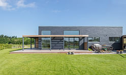 Sustainable slate tiles dress this Danish family’s energy-efficient “Future House”