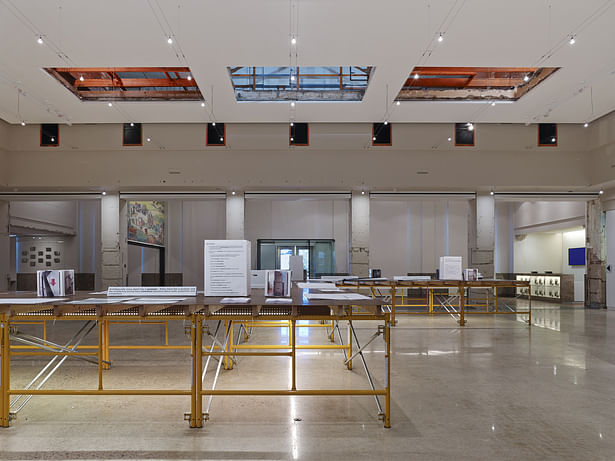 A view looking east towards the front door. The ghosts of the three skylights and security catwalk windows are clearly visible. Surprisingly the exposed steel has orange primer. 