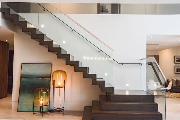 A new layout and design for this contemporary staircase complements the style of this home perfectly.
