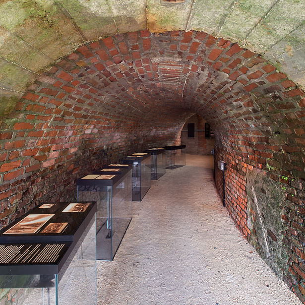 Antecedents: A sequence of horizontal surfaces with backlit documents leads deep into the tunnel system. In five “flashlights”, the prior history in the 1920s and 1930s is sketched.