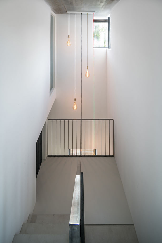 the spacious central staircase is a key element in the house.