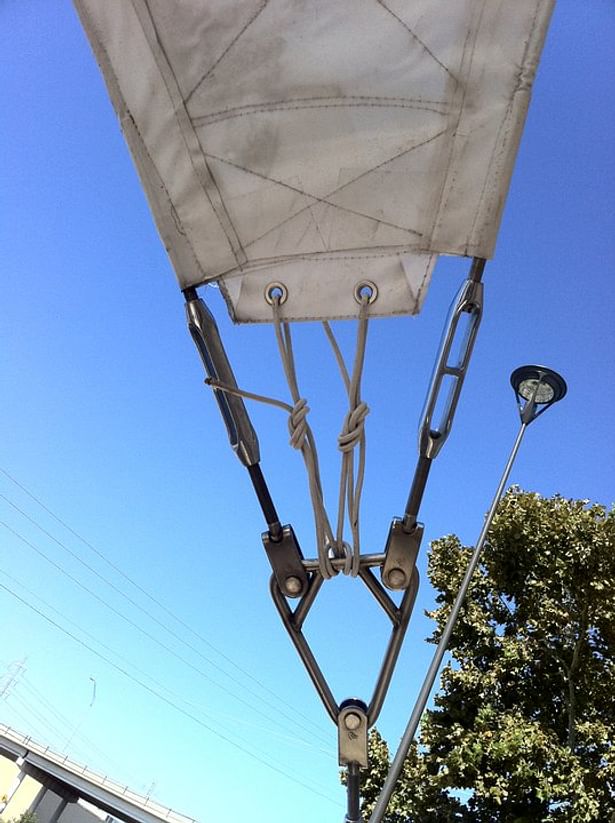 Ropes and knots were used to keep the fabric in place at the stainless steel connections.