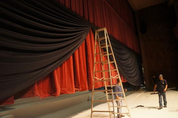 Part of the project was to frame the stage, finding an appropriate fabric, light enough to hang but still opaque and with body was one of the tasks.