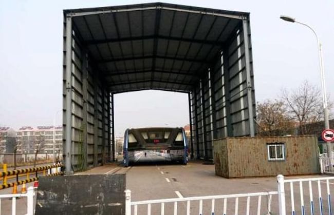 Presented as the public transit future back in August, the Transit Explore Bus has since been left abandoned on a public road in Qinhuangdao. (Image via shanghaiist.com)