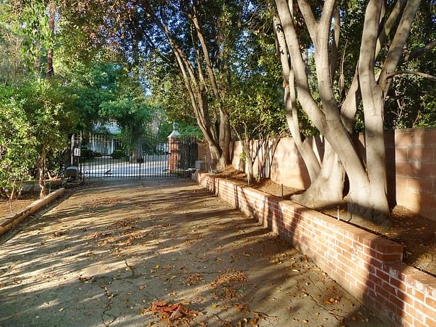 Original driveway and gate, 2009. Gate is still in use with new paint and motor.