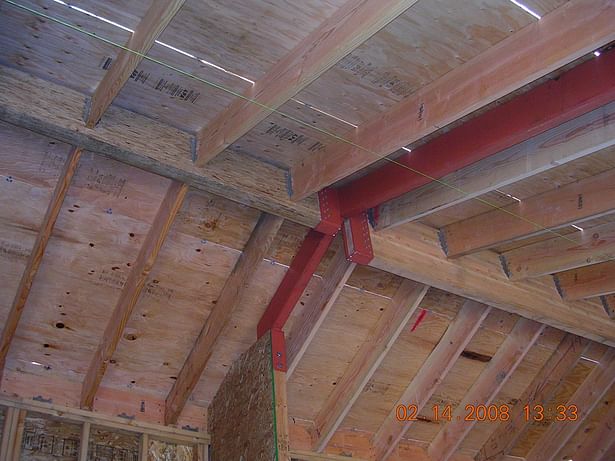 Steel bent supporting two ridge beams. 