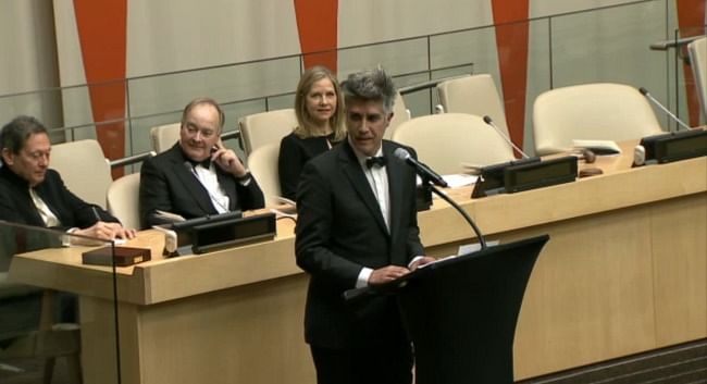 Alejandro Aravena accepts the Pritzker Prize during a ceremony at the United Nations in New York City