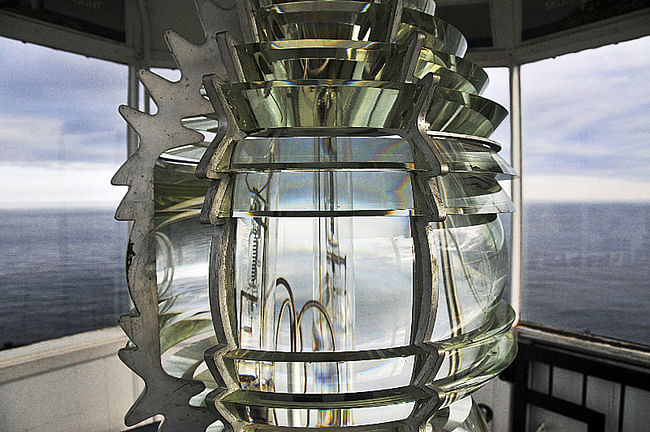 '...or a beckoning lighthouse Fresnel lens that reflects the sky.' Image courtesy of REX.
