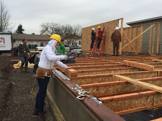OregonBILDS students build the subfloor and begin erecting walls for the house