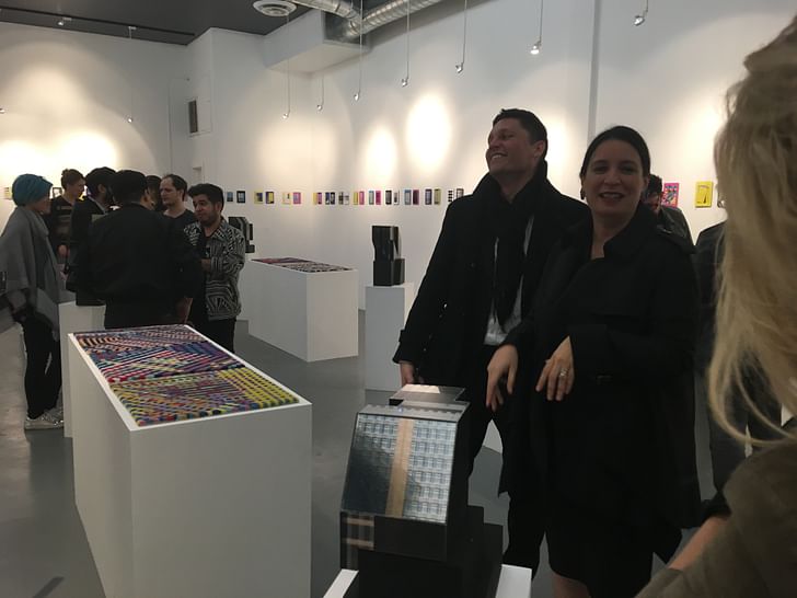 Andrei Zerebecky (third from right) and Elena Manferdini (second from right) get into the groove of the 'Building Portraits' opening at ToCo Haus Gallery. 