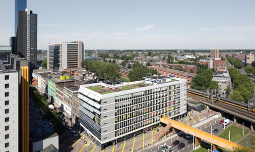 The Luchtsingel complex in Rotterdam includes a rooftop vegetable garden and park connected to the centre of the city by a 390m wooden pedestrian bridge, which is scheduled to be finished by the end of this year. Crowdfunders can fund a section of the bridge, even just a plank, in exchange for being able to customise it with their name or message to the city. (The Guardian; Photograph: Ossip van Duivenbode)