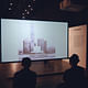 Student's watch a video of the new M+ Museum in Hong Kong designed by Foster + Partners.