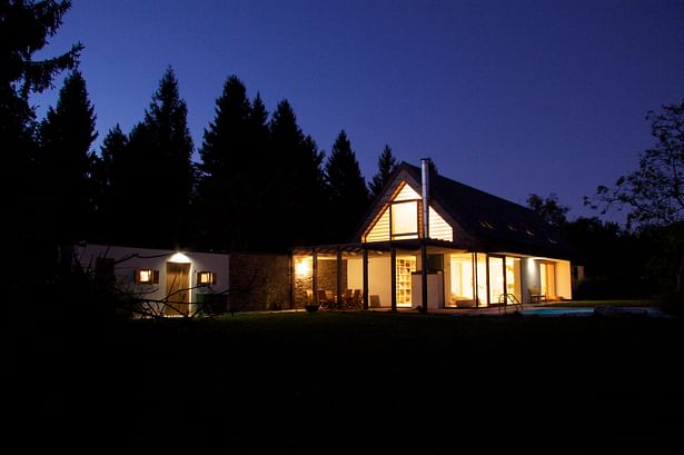 House A, exterior, night view