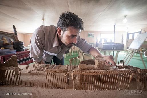 Using clay and wooden kebab skewers, Syrian refugee Mahmoud Hariri built a model of the ancient city of Palmyra. (Photo: UNHCR/Christopher Herwig)