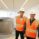 San Francisco Museum of Modern Art director Neal Benezra (l to r) and lead architect Craig Dykers stand in the Roberts Family gallery with the Richard Serra's sculpture 'Sequence' at the San Francisco Museum of Modern Art (photo by Lea Suzuki, The SF Chronicle)