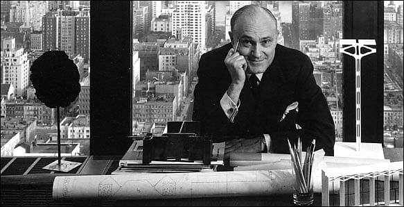 Philip Johnson in his office, 1957, Arnold Newman/Getty Images.