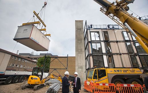Construction workers installing modular flats for an estate regeneration project in Lambeth (Credit: Heathcliff O'Malley)
