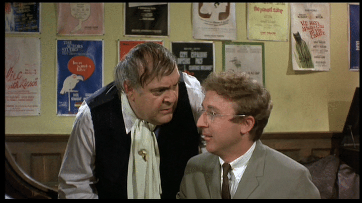Accountant Leo Bloom discusses issues with client Max Bialystock in 1968's The Producers. Photo via classicmovienight.wordpress.com 