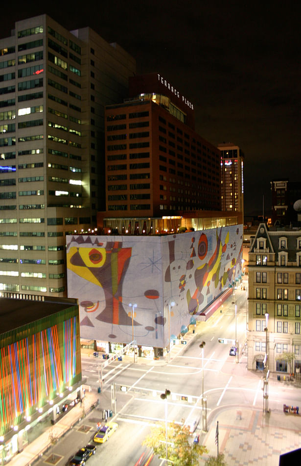 composite image of Miró mural projected onto building