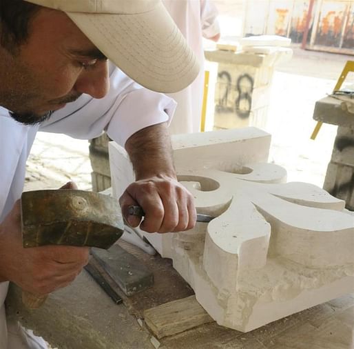 Student honing his carving skills. Photo: World Monuments Fund.