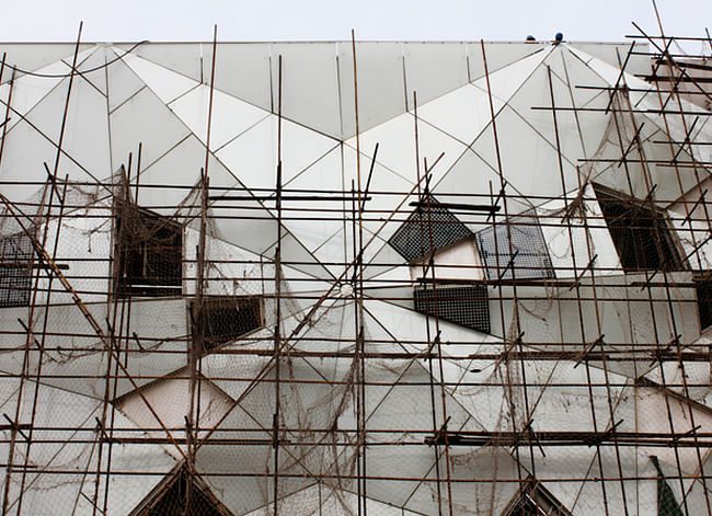 Scaffolding on the geometric façade of the Datong Library. Credit: Preston Scott Cohen, Inc.
