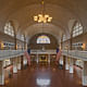 The Ellis Island Registry Room was originally constructed in 1900 by architects Boring and Tilton with a plaster ceiling, and was reconstructed with a beautiful tile ceiling by the Guastavino Company in 1917; literally becoming a palace for the people of sorts, where millions of immigrants passed through. However, the vaulting wasn't just stunning, it was also structurally stable. When Ellis Island was abandoned for decades and its buildings fell into terrible disrepair, the Guastavino vault...