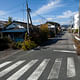 A deserted street inside the contaminated exclusion zone around the crippled Fukushima Dai-ichi nuclear power station, viewed through a bus window near Okuma, Japan, on November 12, 2011. (AP Photo/David Guttenfelder)