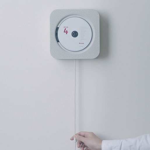 Wall-mounted CD player for Muji, designed by ​Naoto Fukasawa.