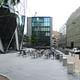 The portion of the plaza adjoining Bury Street provides seating for patrons of the restaurant in the six-story annex building. Photograph by author.