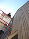 Students completing siding