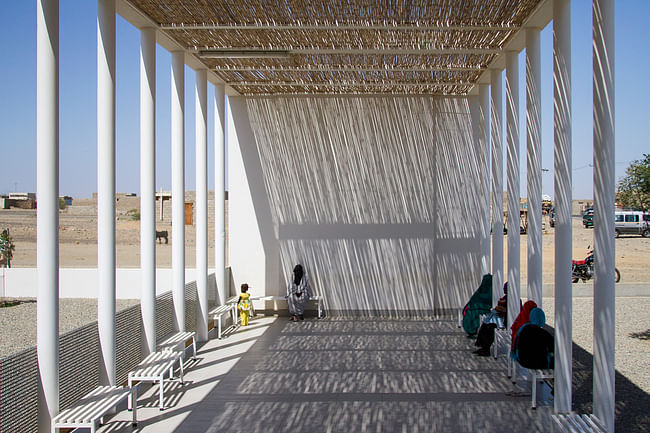 Wooden blinds shade a public terrace at the Port Sudan pediatric clinic. Credit Massimo Grimaldi and Emergency.