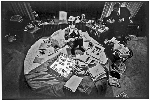 Hugh Hefner at the helm of his media empire: the bed. Image via averyreview.com.