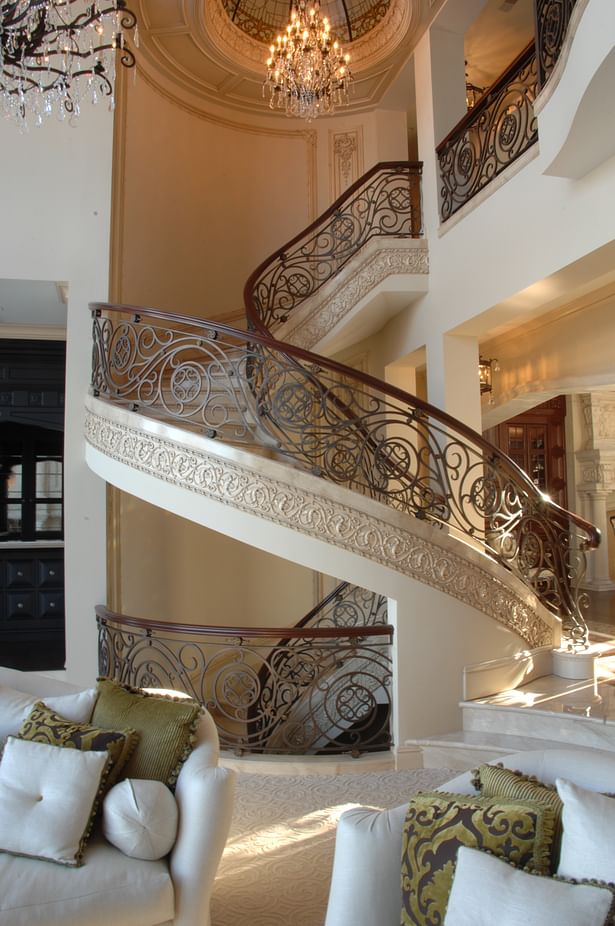 Grand staircase of custom estate.