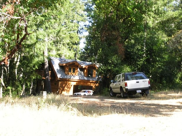 Driveway to Garage w/ Group Rooms above