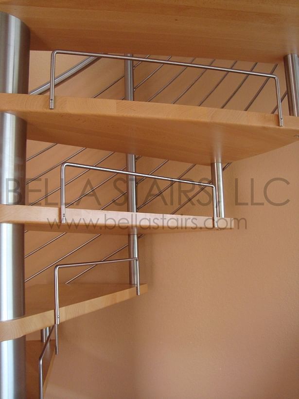 Stainless Steel Riser Bars were installed under each Wood Tread.