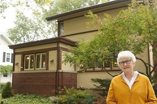 Madison, Wis. resident Linda McQuillen in front of her home, which turned out to be a FLW original. Photo by Carrie Antlfinger, via Times Colonist.
