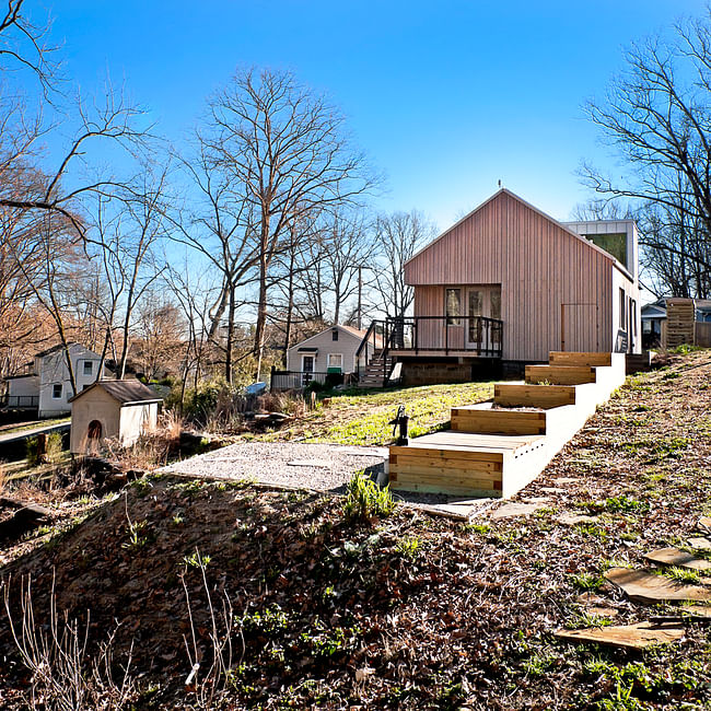View of vegetable beds and gravel plinth from community path. Photo credit: Ken McCown 