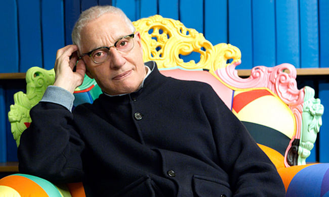 European Prize for Architecture laureate Alessandro Mendini sitting on a Proust Armchair, one of his many iconic designs.