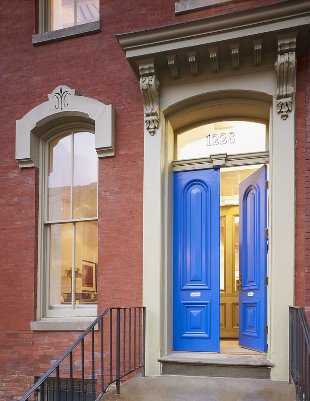 Blue doors of BELL Architects main entry