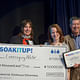 “Leveraging Water” Team of Muscoe Martin, m2 Architecture (far right) and Laura Hansplant, Roofmeadow (second from right) accept award for Industrial: Warehouse Watershed category © CG Lawrence Photography (Gregory Clarke)