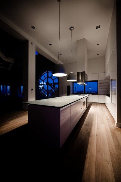 GLAM Kitchen - the cooktops are built into the countertop with separate swing-door ovens installed below.