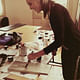 Hannah Smith painting a wall panel for the client presentation Mood Board