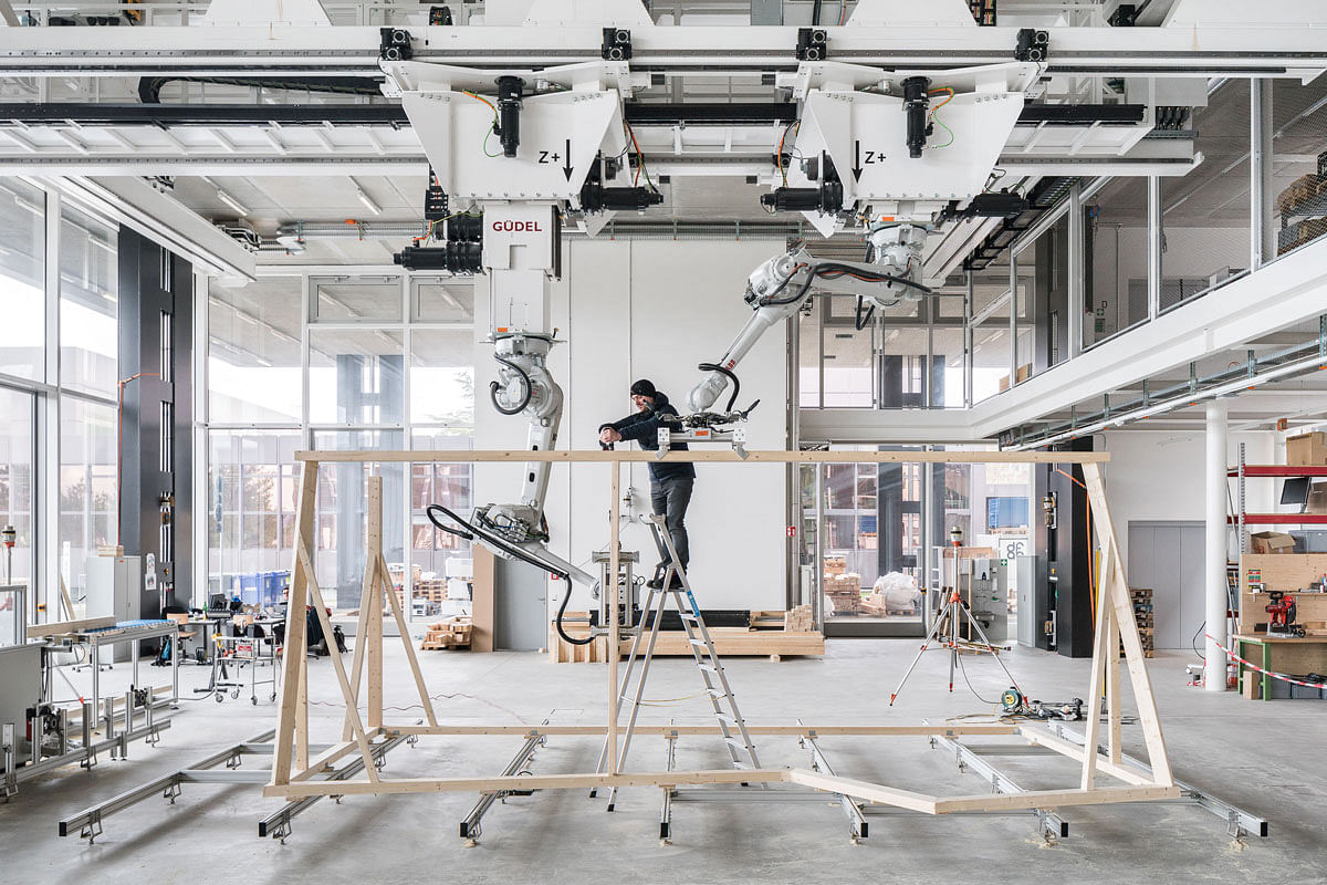 Watch these robots build a timber house structure in